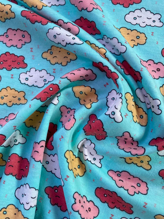 CLEARANCE - Sleepy Clouds Printed Cotton Jersey Fabric 58" – Turquoise Blue / Multi – 2-Way Stretch