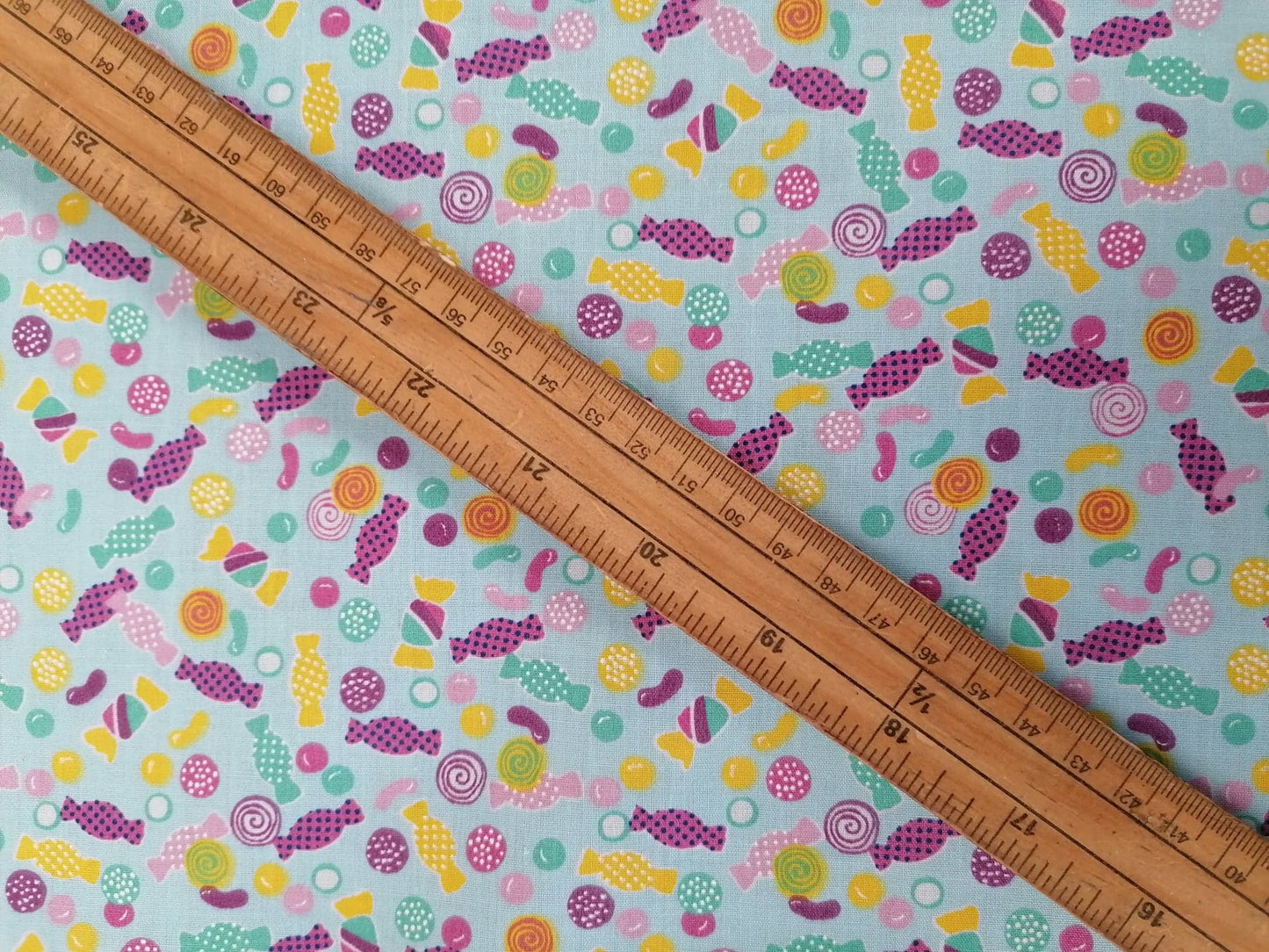 100% Cotton - Confectionery - Blue/Purple/Pink/Yellow - 45" Wide - Sold By The Metre