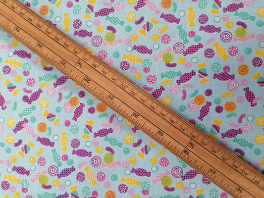 100% Cotton - Confectionery - Blue/Purple/Pink/Yellow - 45" Wide - Sold By The Metre