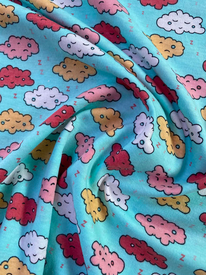 CLEARANCE - Sleepy Clouds Printed Cotton Jersey Fabric 58" – Turquoise Blue / Multi – 2-Way Stretch