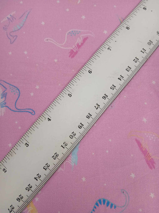 100% Cotton - Dinosaurs - Pink/Blue/Yellow - 44" Wide - Sold By The Metre