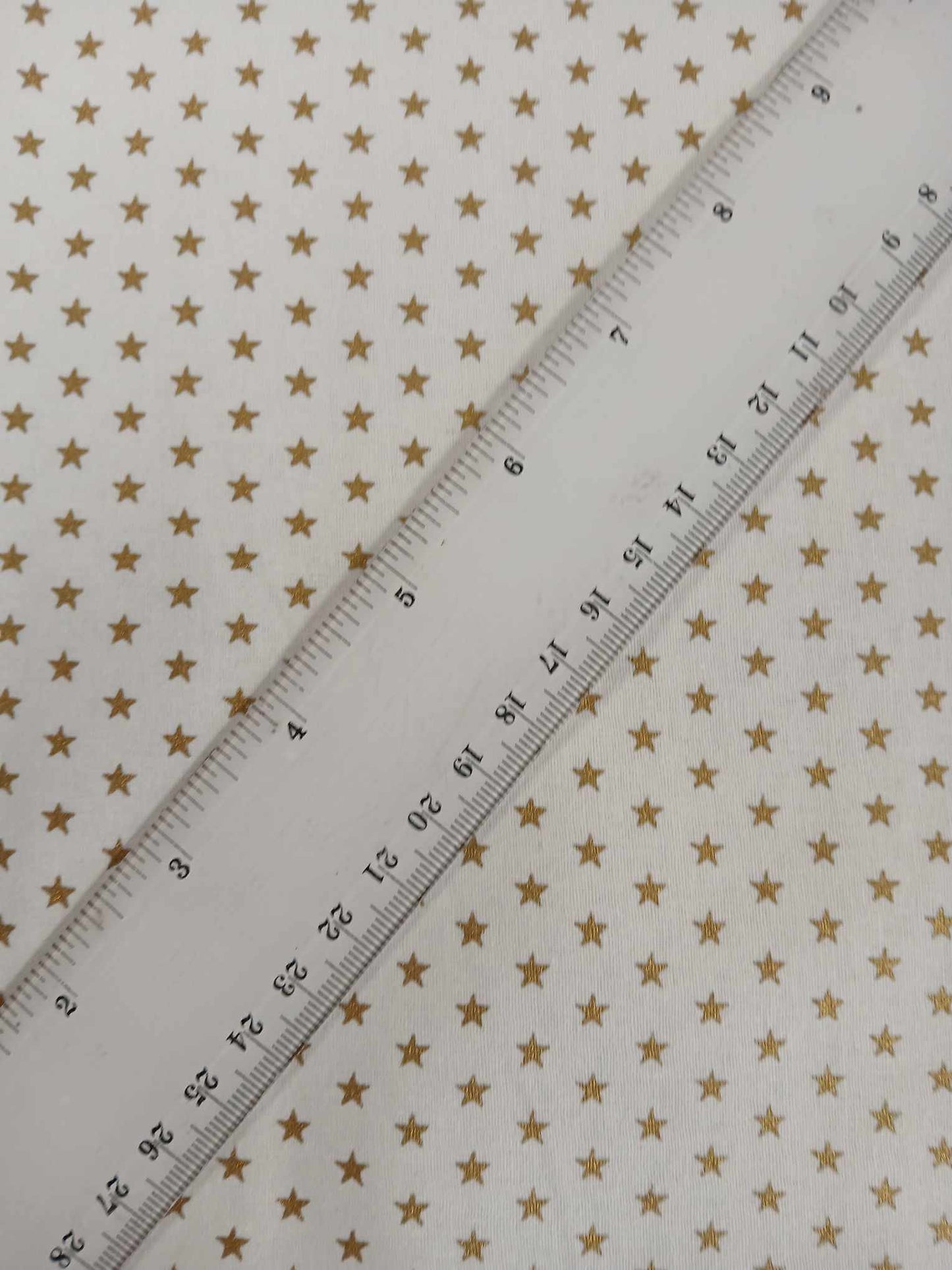 100% Cotton - Christmas Stars - White/Gold - 44" Wide - Sold By the Metre