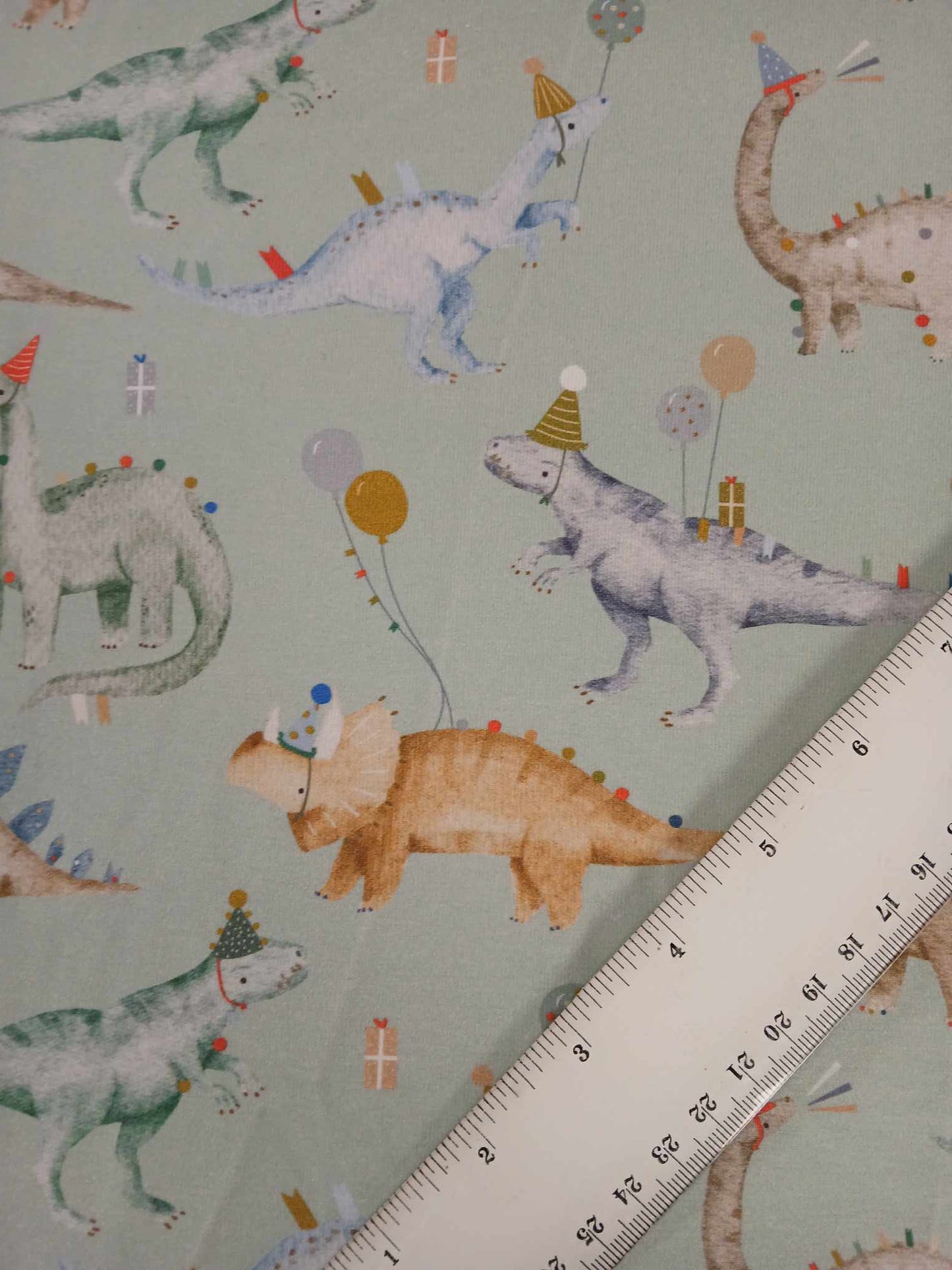 Clearance - 95% Cotton 5% Lycra Jersey - Dinosaurs - Green/Brown/Grey - 62" Wide - Sold As A 2.5 Metre Piece