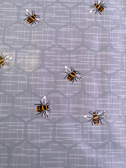 Grey & Orange Bee Print PU Table Covering - 55" Wide - Nature Inspired - Wipe Clean - £1.99/m