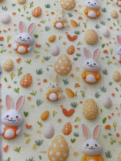 Little Johnny Easter Bunnies Cotton Jersey - 58" Wide - 95% Cotton 5% Lycra - Cream & Orange
