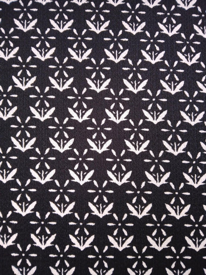 Woodstock Knitted Blister - Black/Cream - 60" Wide - Sold By The Metre