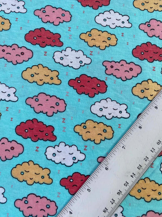 CLEARANCE - Sleepy Clouds Printed Cotton Jersey Fabric 58" – Turquoise Blue / Multi – 2-Way Stretch