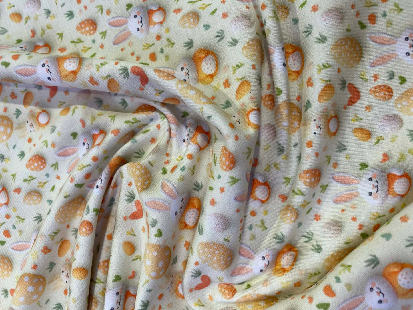 Little Johnny Easter Bunnies Cotton Jersey - 58" Wide - 95% Cotton 5% Lycra - Cream & Orange