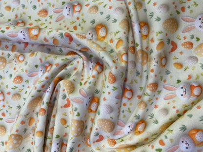 Little Johnny Easter Bunnies Cotton Jersey - 58" Wide - 95% Cotton 5% Lycra - Cream & Orange