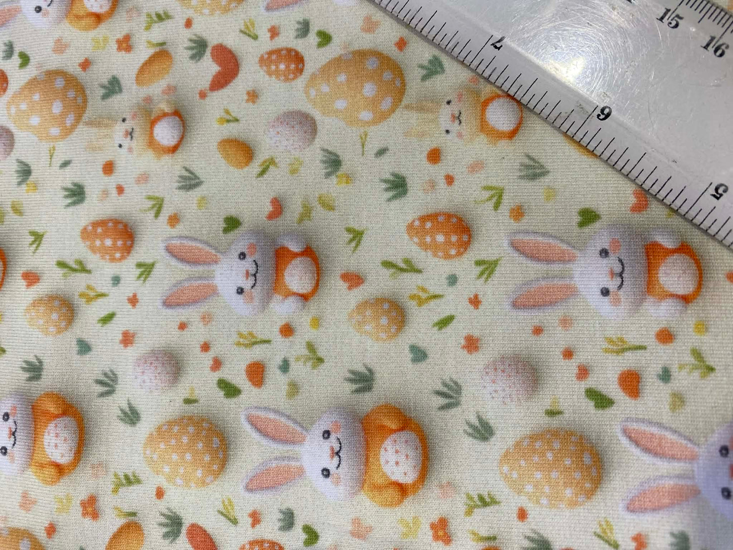 Little Johnny Easter Bunnies Cotton Jersey - 58" Wide - 95% Cotton 5% Lycra - Cream & Orange