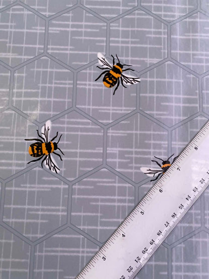 Grey & Orange Bee Print PU Table Covering - 55" Wide - Nature Inspired - Wipe Clean - £1.99/m