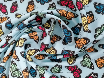 Scuba - Butterflies - Blue/Yellow/Red/Green - 56" Wide - Sold By the Metre